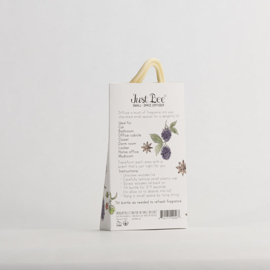 Just Bee Blackberry Anise Small-Space Hanging Diffuser, angled back of the pack with star anise and blackberries.