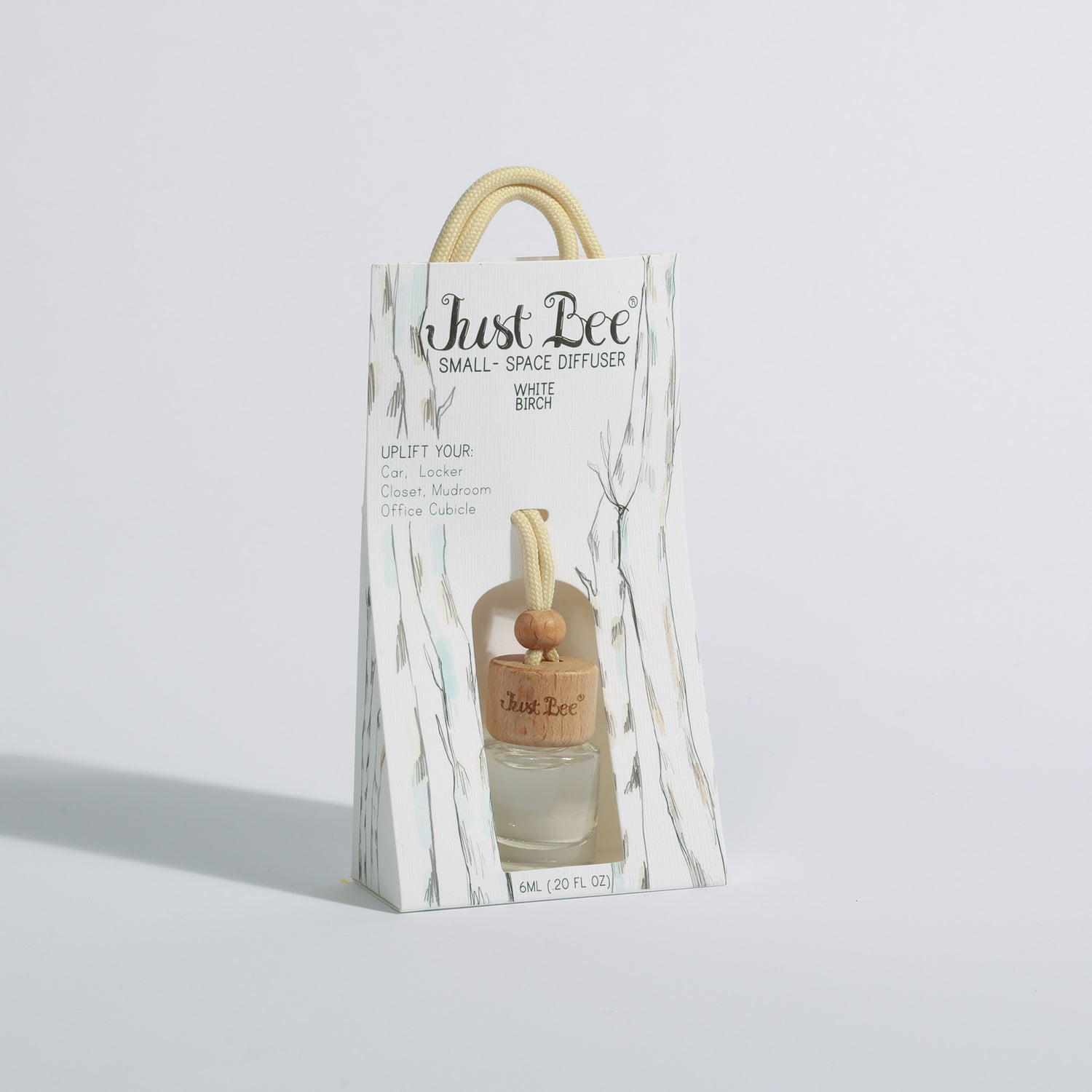 Just Bee Small-Space Hanging Diffuser gift bag labeled White Birch with a natural wood stopper, slightly different angle.