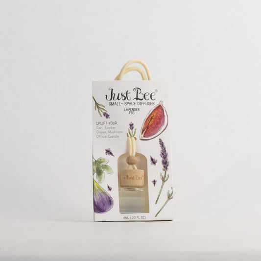 Just Bee Lavender Fig Small-Space Hanging Diffuser, pack front painted with a halved fig and lavender sprigs.