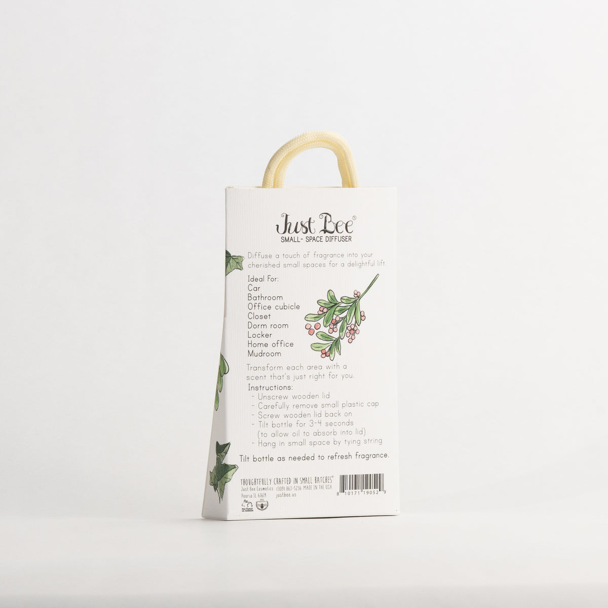 Just Bee Holly & Ivy Small-Space Hanging Diffuser, angled back of the pack with a holly sprig and usage details.