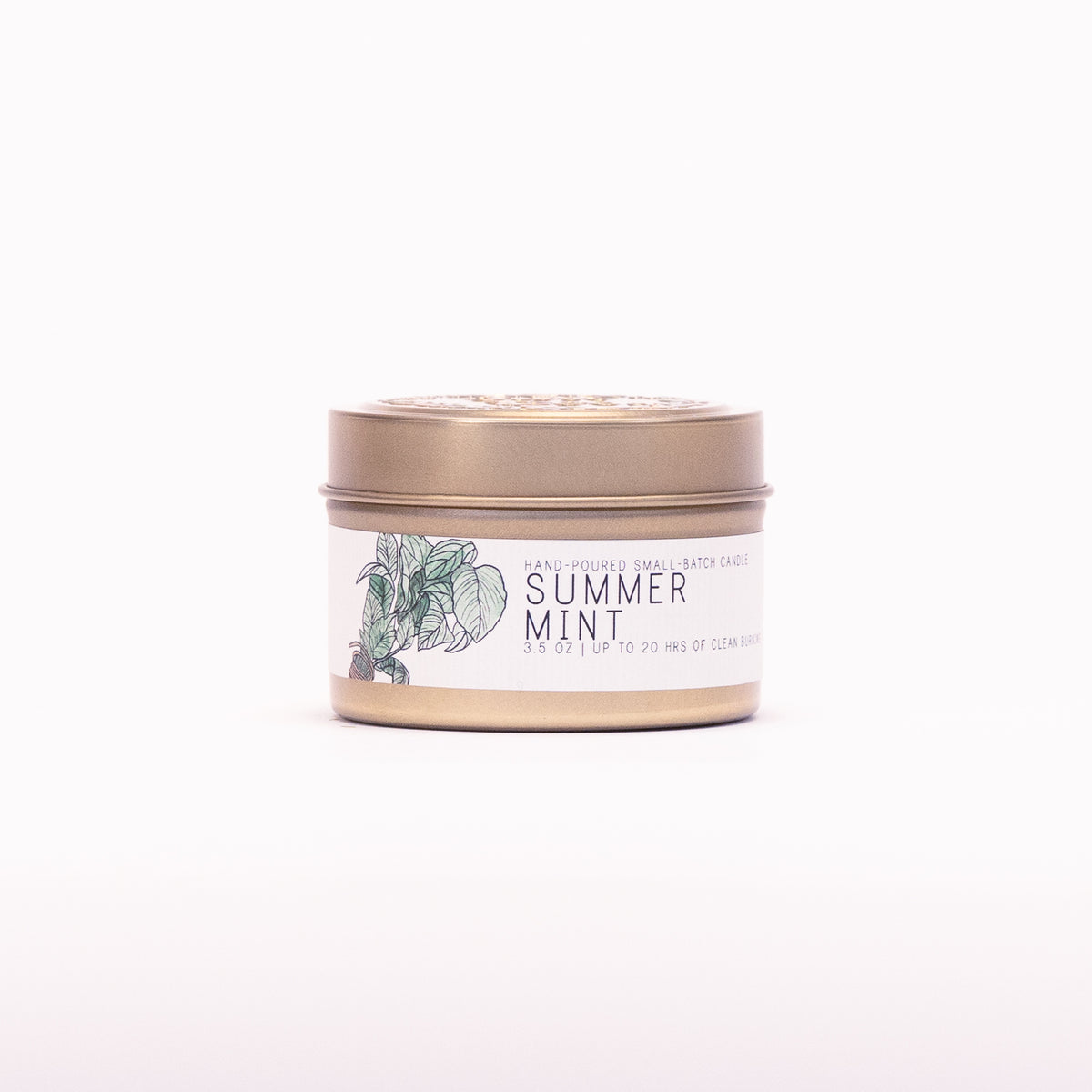 Just Bee Summer Mint candle in a closed gold travel tin, mint sprig label facing forward.
