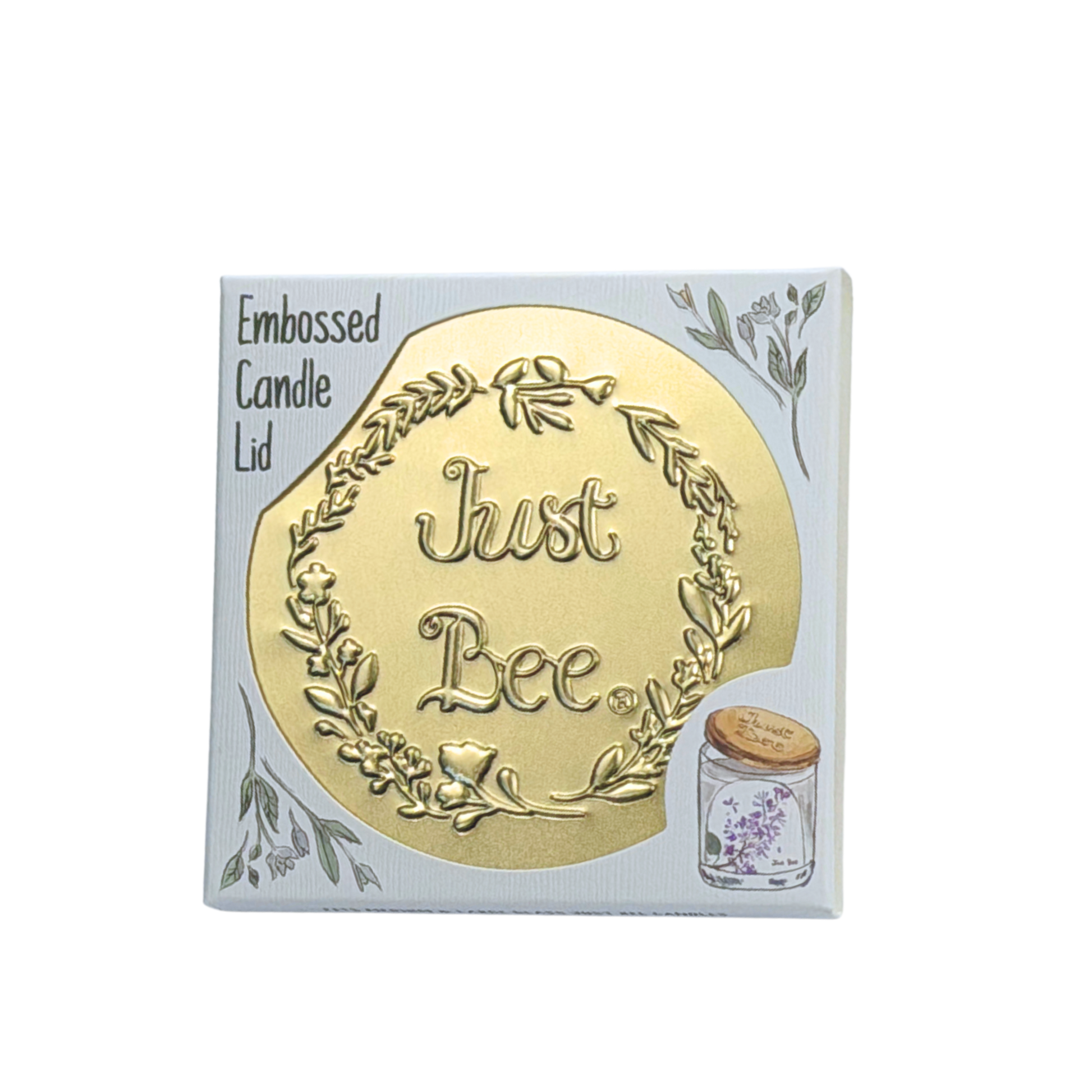 Gold embossed candle lid with the text 'Just Bee' surrounded by floral designs.